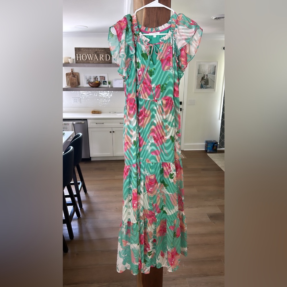 Only worn once to a wedding. Bought summer of 2023 from a southern boutique.
